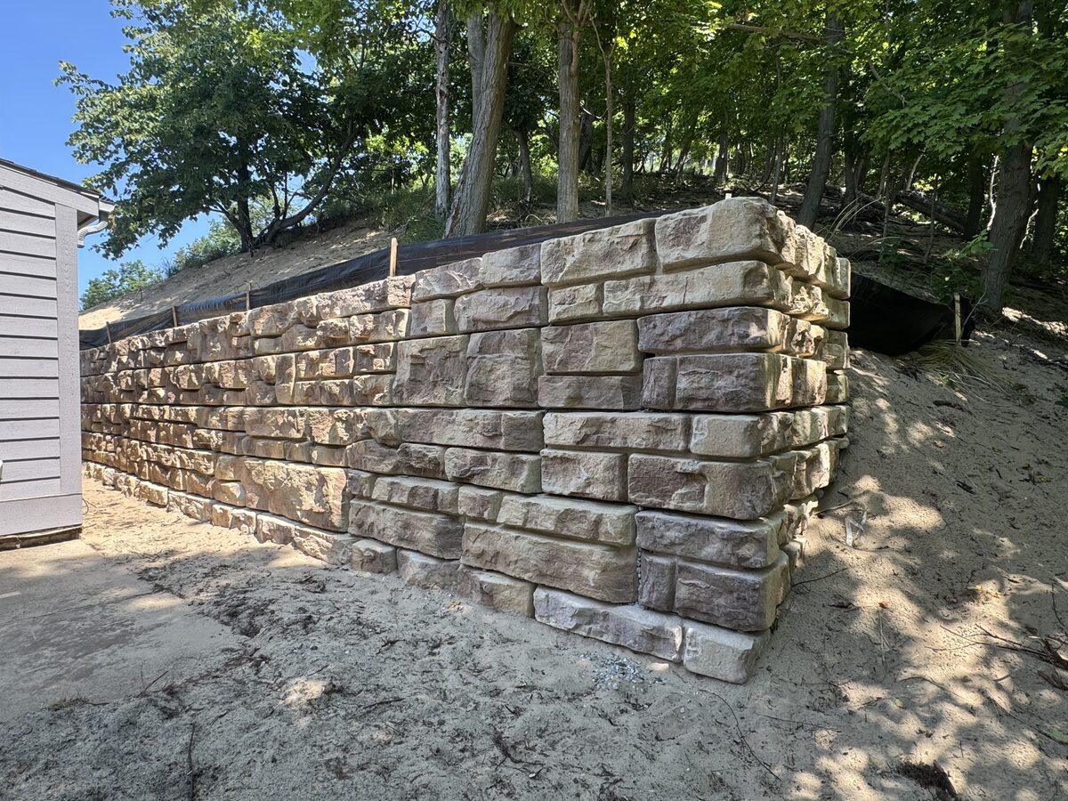Retaining wall rebuilt on a lakeshore dune by Ryerson Brothers Excavating