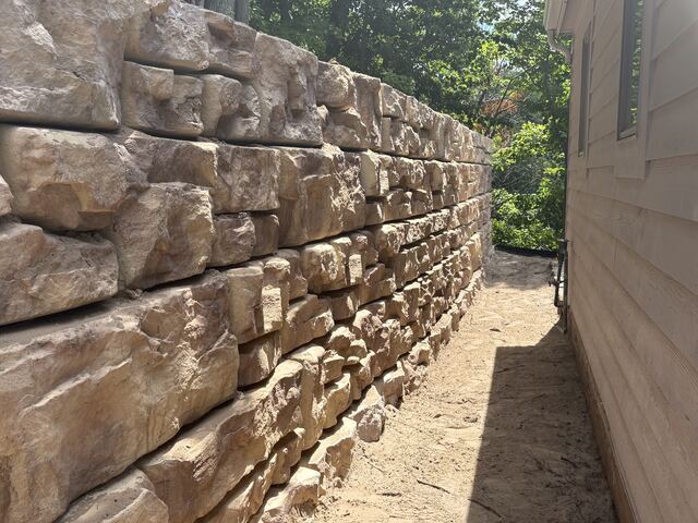 Completed stone retaining wall