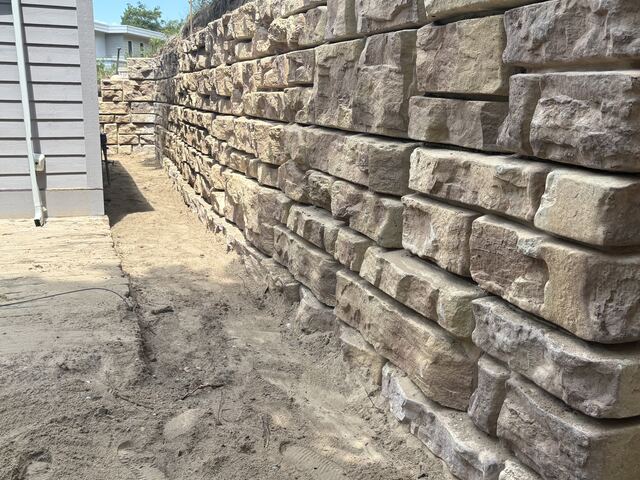 New segmental block retaining wall under construction